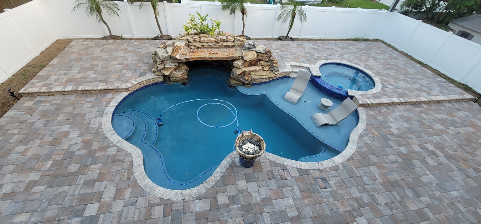 Professionally cleaned and sealed paver pool deck in Tampa Bay